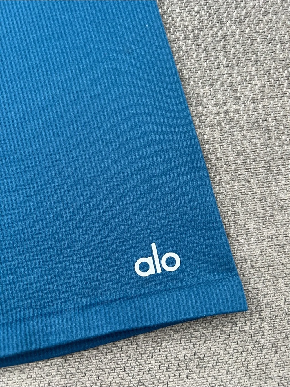 ALO Yoga Ribbed High-Rise Bike Shorts in Teal Blue